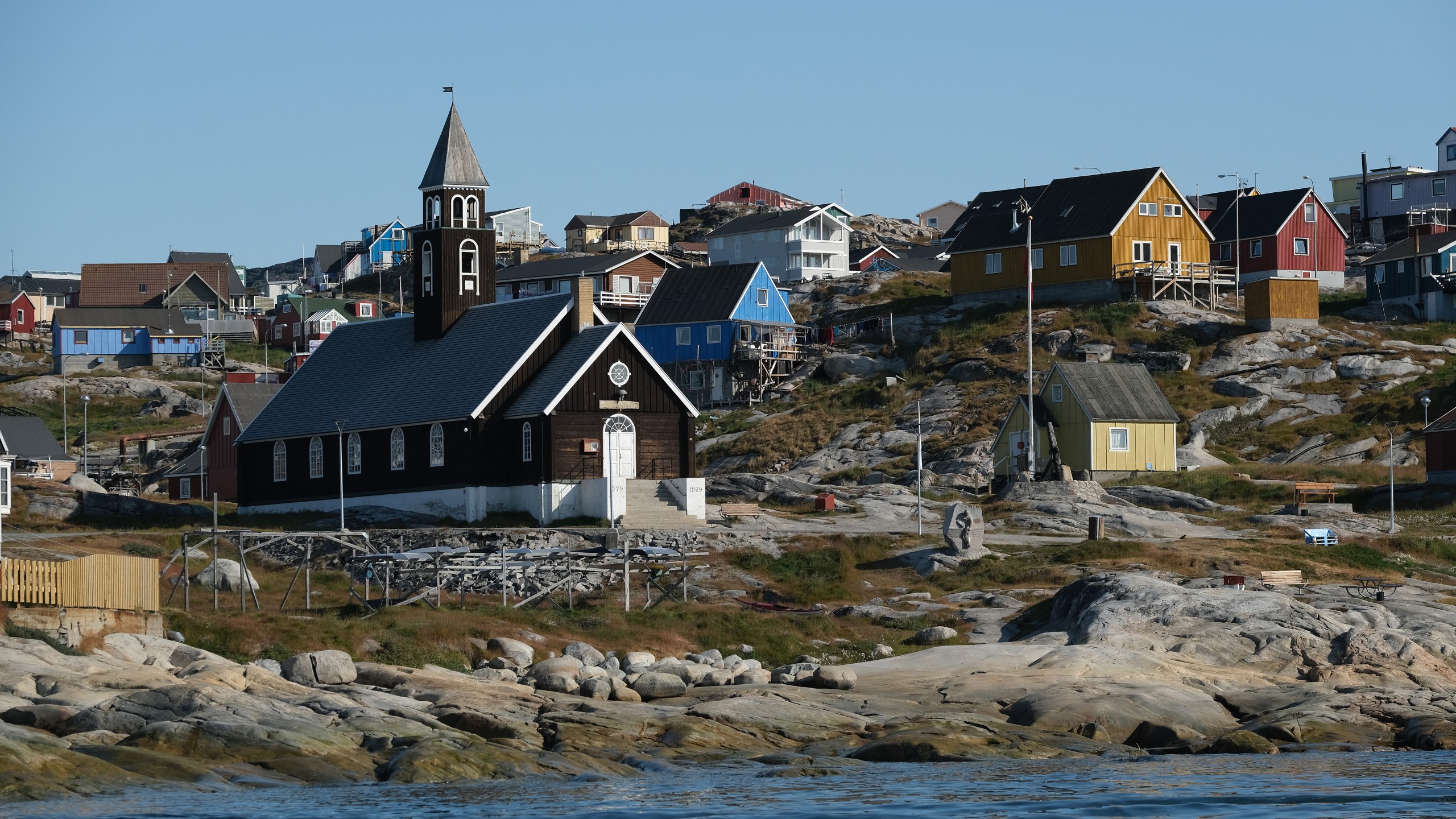 Zion Lutheran Church, built in 1779, stands on Disko Bay on August 04, 2019 in Ilulissat, Greenland. (Credit: Sean Gallup/Getty Images)