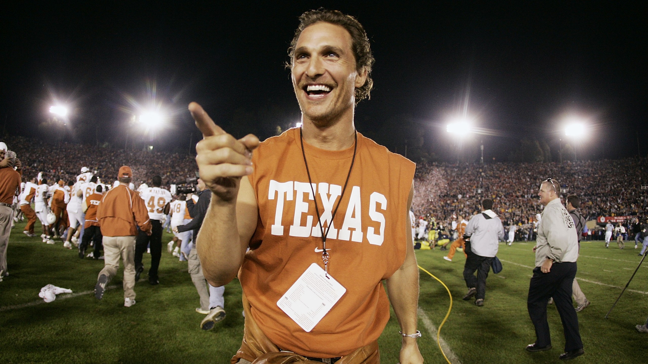 Actor Matthew McConaughey celebrates on the field after the Texas Longhorns defeated the Michigan Wolverines in the 91st Rose Bowl Game at the Rose Bowl on January 1, 2005 in Pasadena, California. (Credit: Donald Miralle/Getty Images)