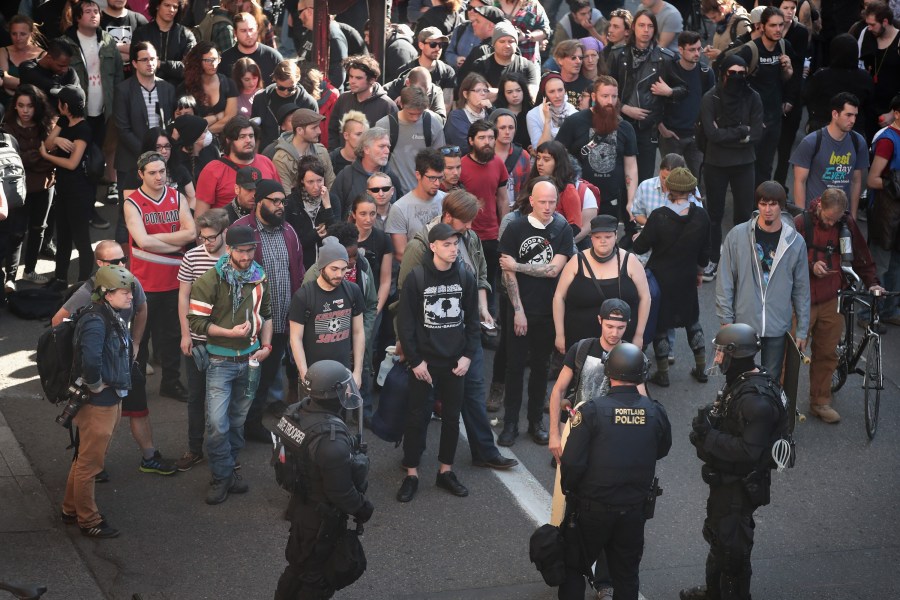 Police detain hundreds of demonstrators "on suspicion of disorderly conduct" during a protest on June 4, 2017 in Portland, Oregon. (Credit: Scott Olson/Getty Images)