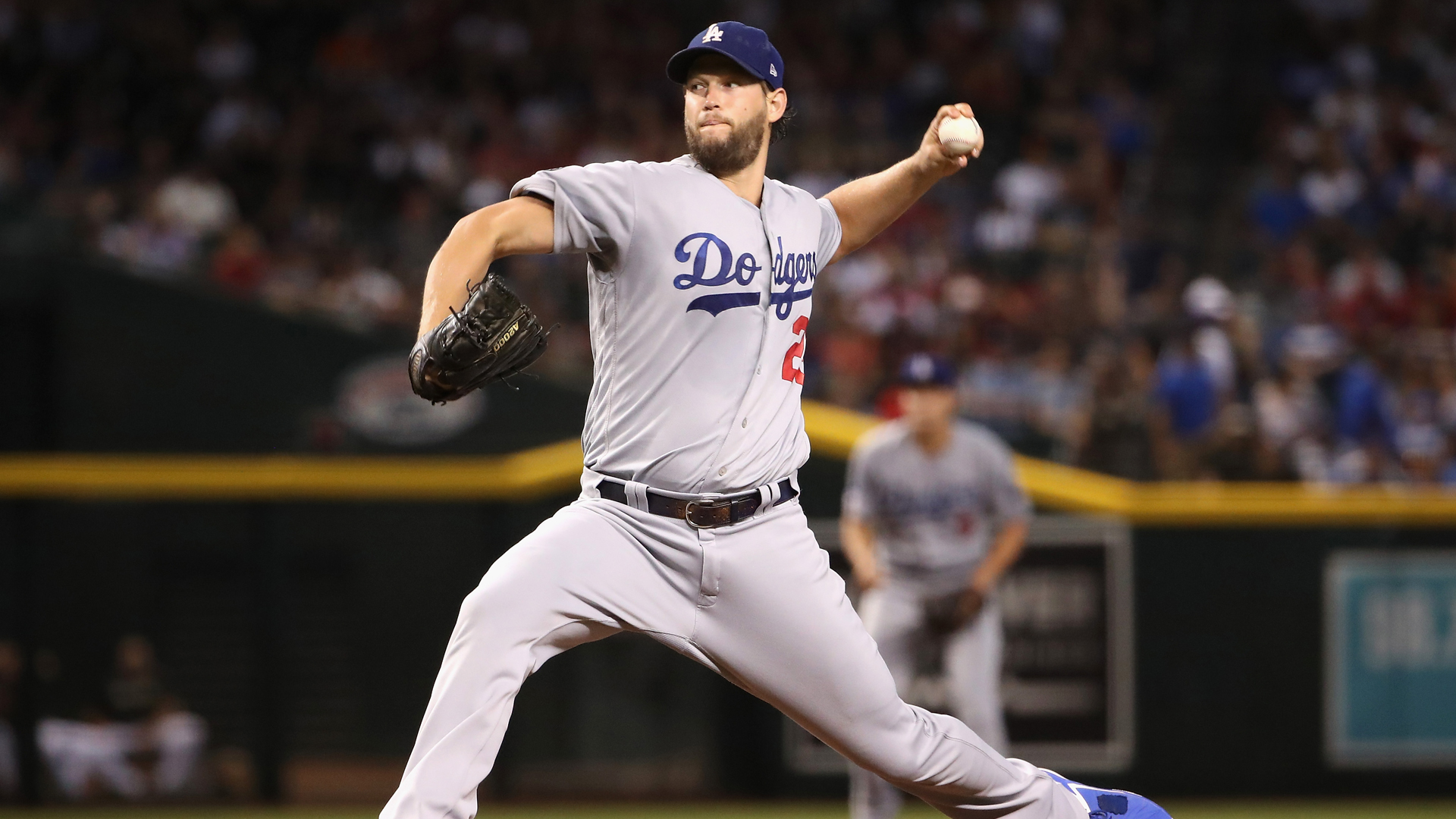 Starting pitcher Clayton Kershaw #22 of the Los Angeles Dodgers pitches against the Arizona Diamondbacks during the first inning of the MLB game at Chase Field on August 31, 2019 in Phoenix, Arizona. (Credit: Christian Petersen/Getty Images)