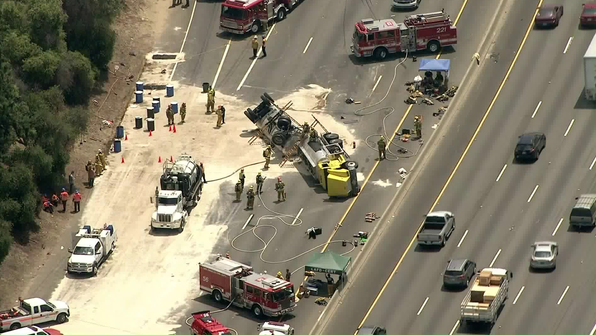 Crews clean up after a fuel tanker overturned on the 5 Freeway near Griffith Park on Aug. 7, 2019. (Credit: Sky5)