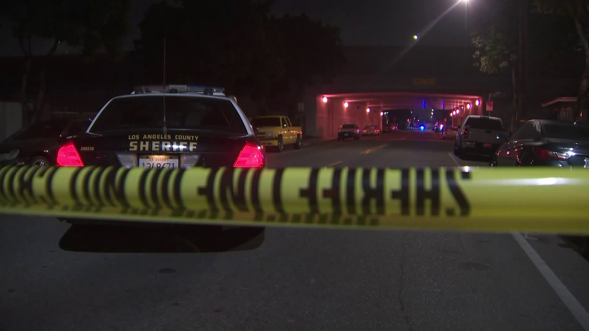 Authorities assess the site of a deputy shooting that preceded a chase in East L.A. on Sept. 2, 2019. (Credit: KTLA)