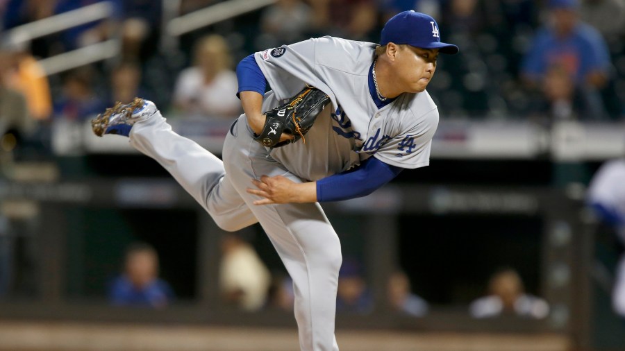 Hyun-Jin Ryu #99 of the Los Angeles Dodgers pitches in the first inning against the New York Mets at Citi Field on September 14, 2019 in New York City. (Credit: Jim McIsaac/Getty Images)