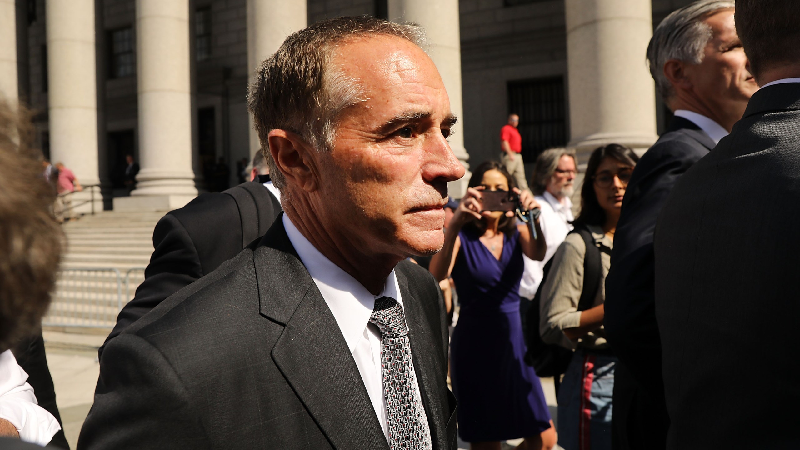 Rep. Chris Collins (R-NY) walks out of a New York court house after being charged with insider trading on August 8, 2018 in New York City. (Credit: Spencer Platt/Getty Images)