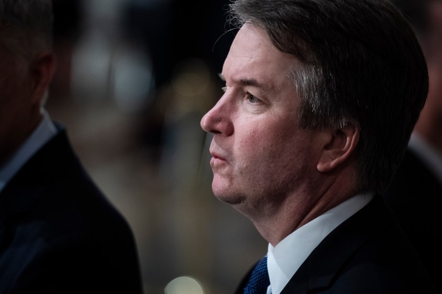 Supreme Court Associate Justice Brett Kavanaugh stands at the U.S Capitol Rotunda as former President George H.W. Bush lies in state on Dec. 3, 2018. (Credit: Jabin Botsford / Getty Images)