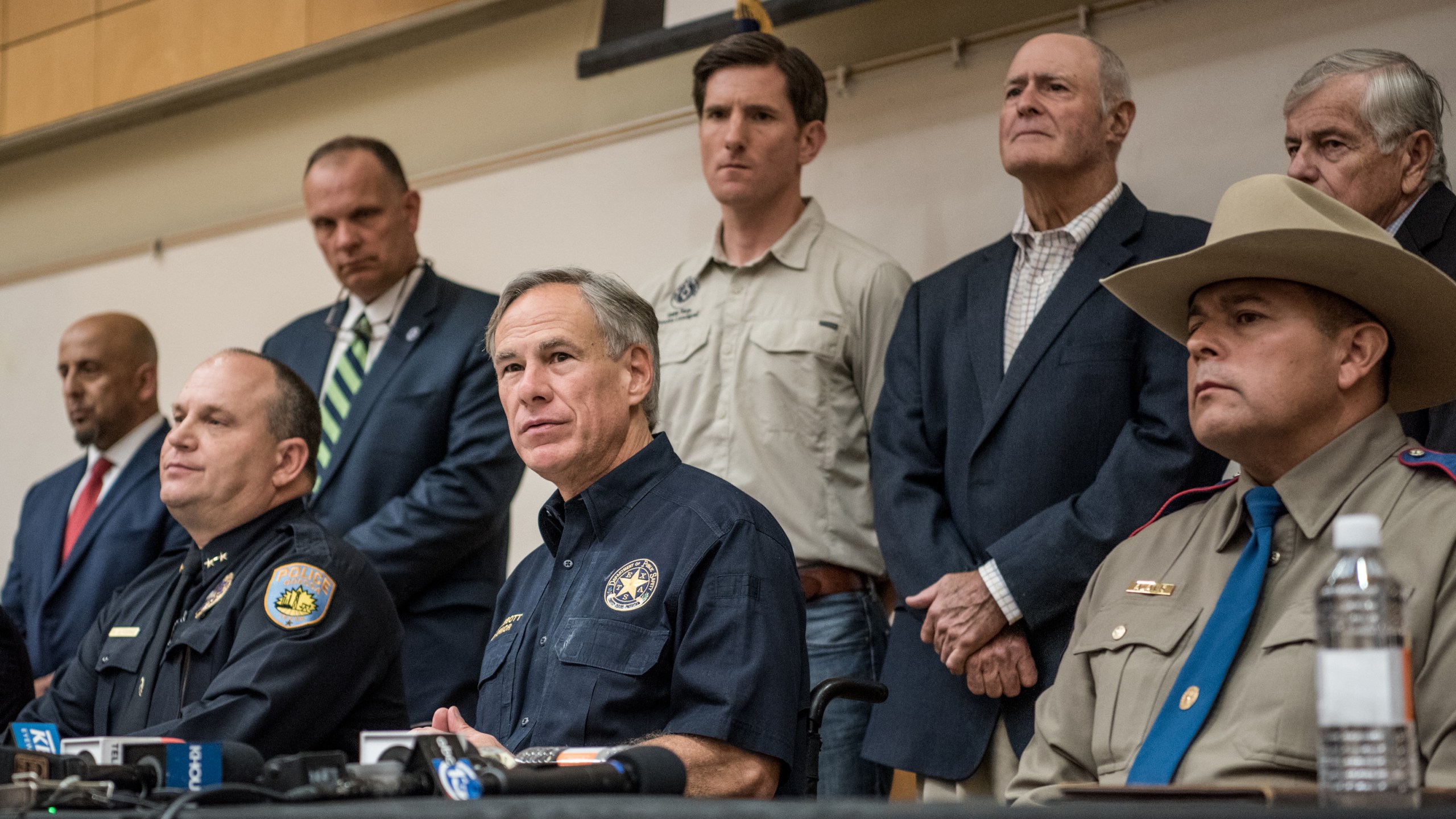 Texas Gov. Greg Abbott (center) holds a press conference with local and federal law enforcement at the University of Texas of the Permian Basin (UTPB) following a deadly shooting on Sept. 1, 2019, in Odessa, Texas.. On the left is Odessa Police Chief Michael Gerke. (Credit: Cengiz Yar/Getty Images)