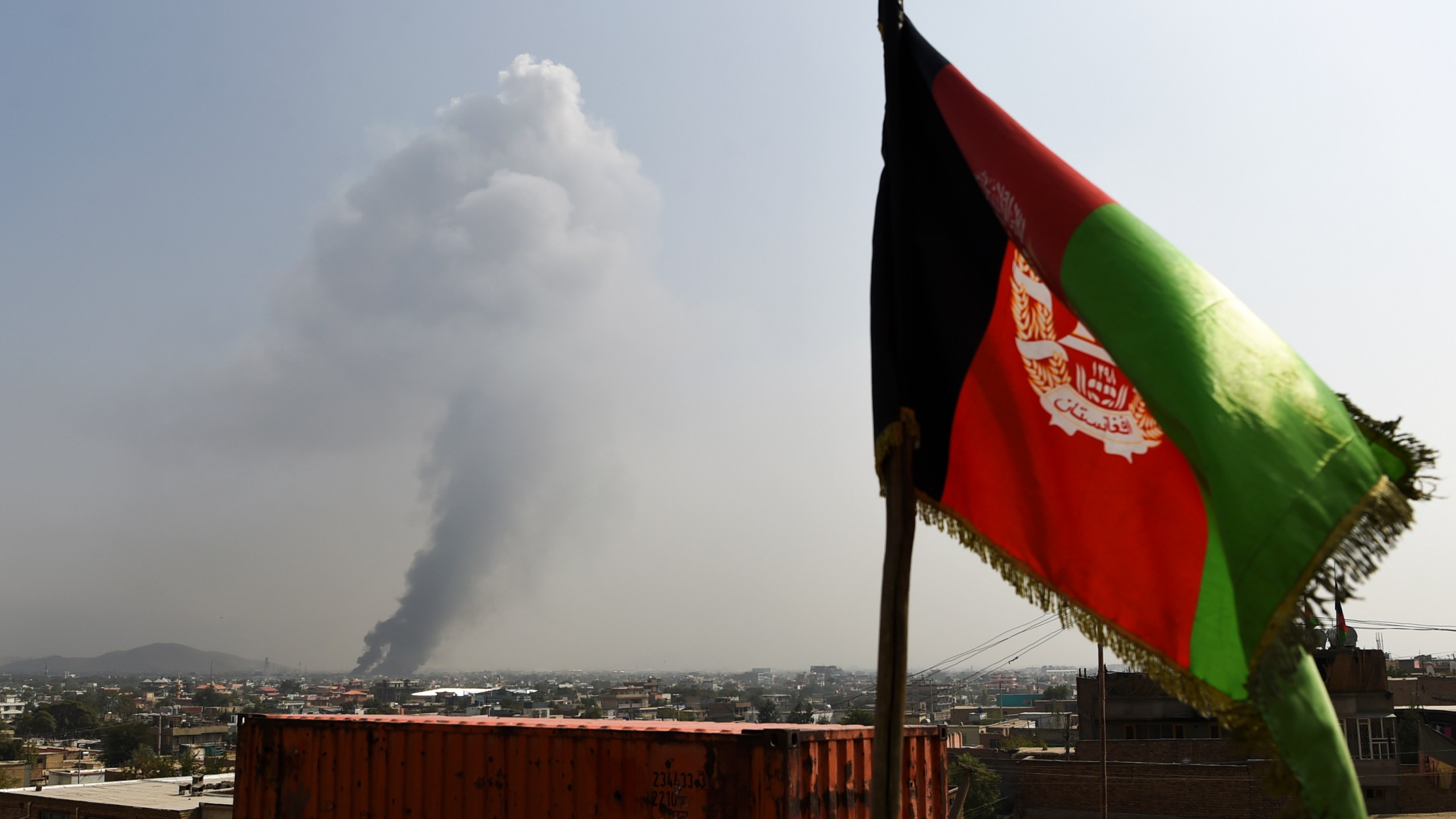 Smoke rises from the site of an attack after a massive explosion the night before near the Green Village in Kabul on Sept. 3, 2019. (Credit: WAKIL KOHSAR/AFP/Getty Images)