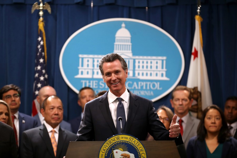 Gov. Gavin Newsom speaks during a news conference with Attorney General Xavier Becerra at the Capitol in Sacramento on Aug. 16, 2019. (Credit: Justin Sullivan / Getty Images)