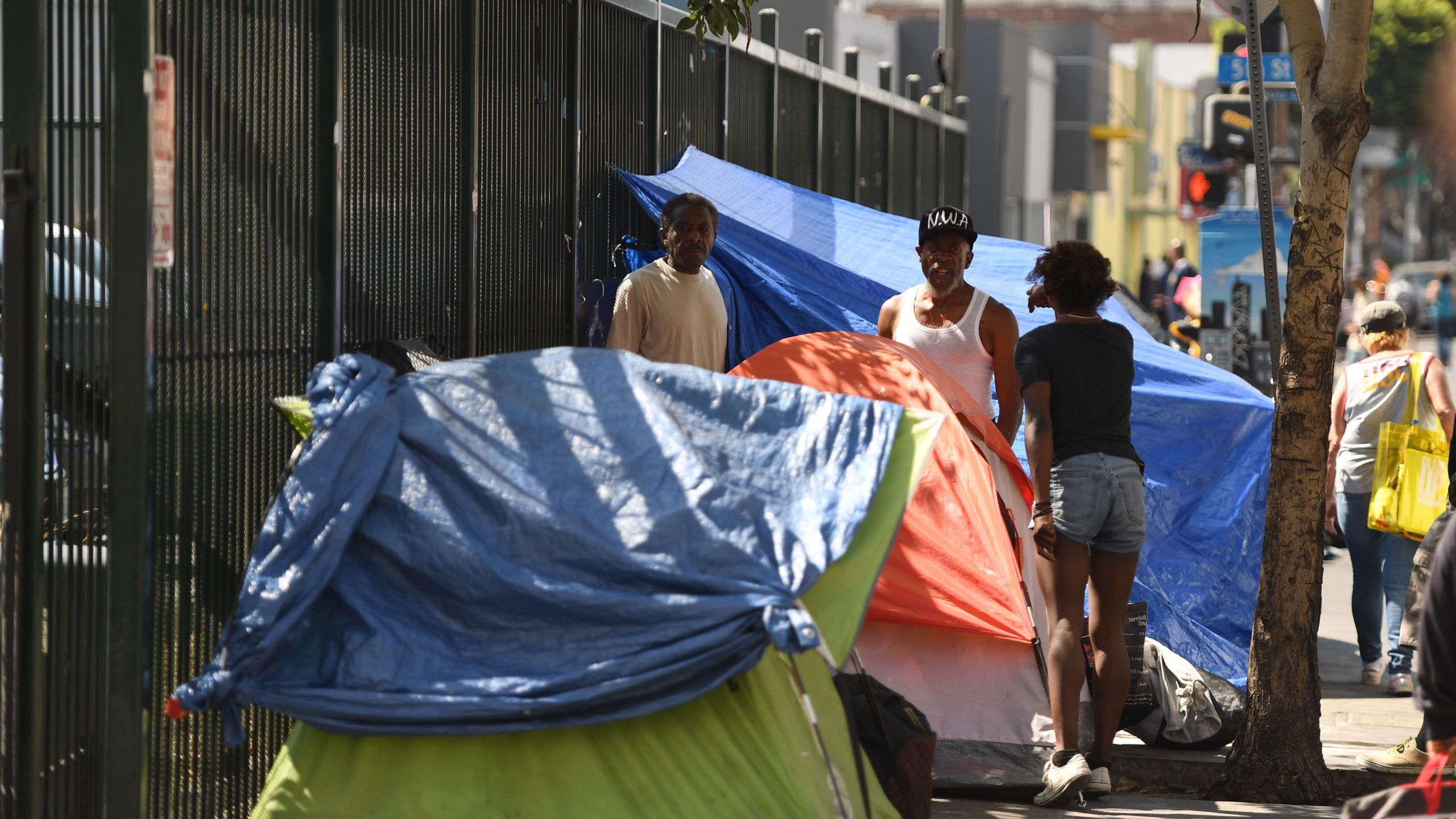 Tents line the street in Skid Row in Los Angeles on Sept. 17, 2019. (Credit: Robyn Beck / AFP / Getty Images)