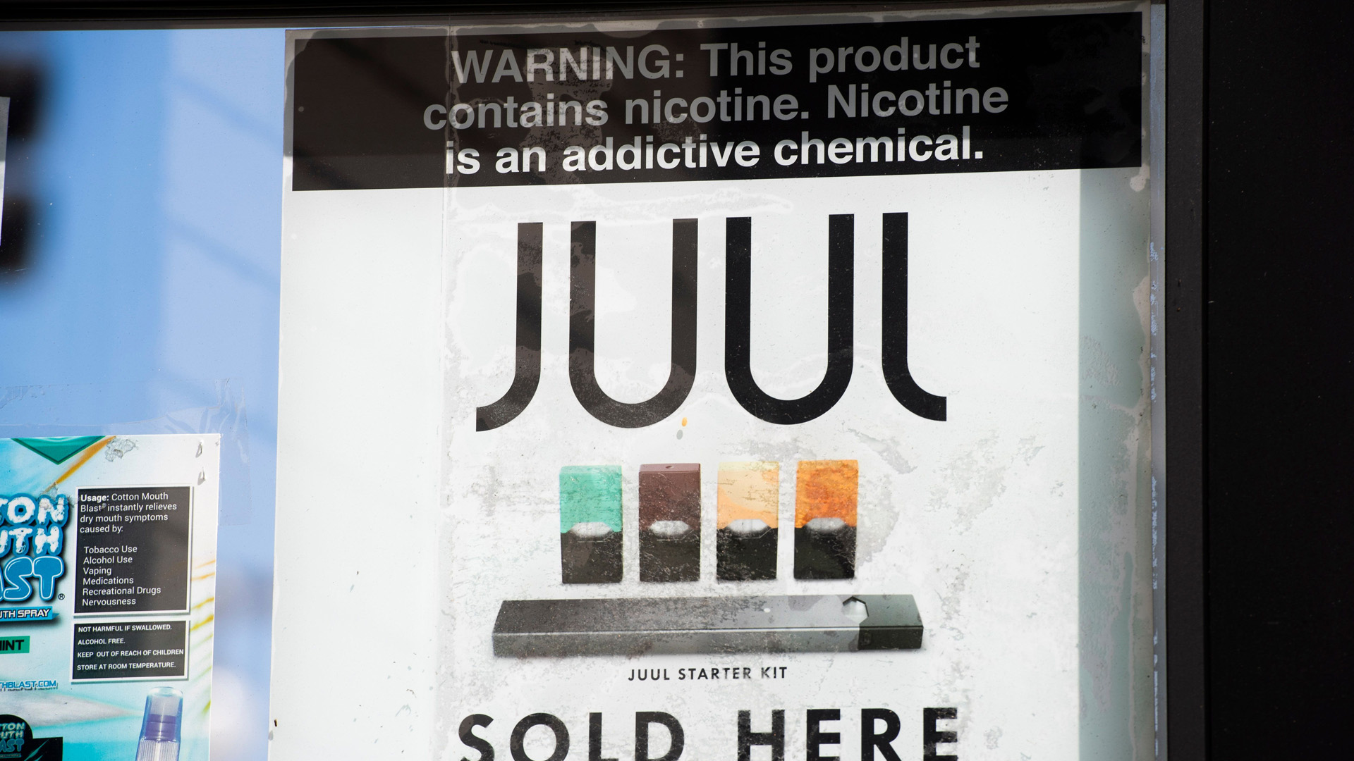 A sign advertises Juul vaping products in Los Angeles, California, September 17, 2019. (Credit: ROBYN BECK/AFP/Getty Images)