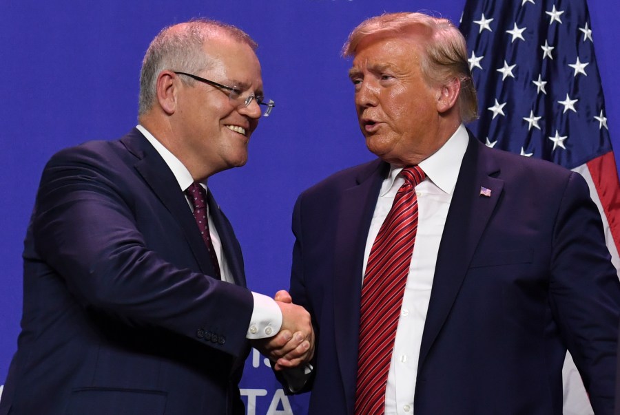 President Donald Trump and Australian Prime Minister Scott Morrison shake hands during a visit to Pratt Industries plant opening in Wapakoneta, Ohio, on Sept. 22, 2019. (Credit: Saul Loeb / AFP / Getty Images)