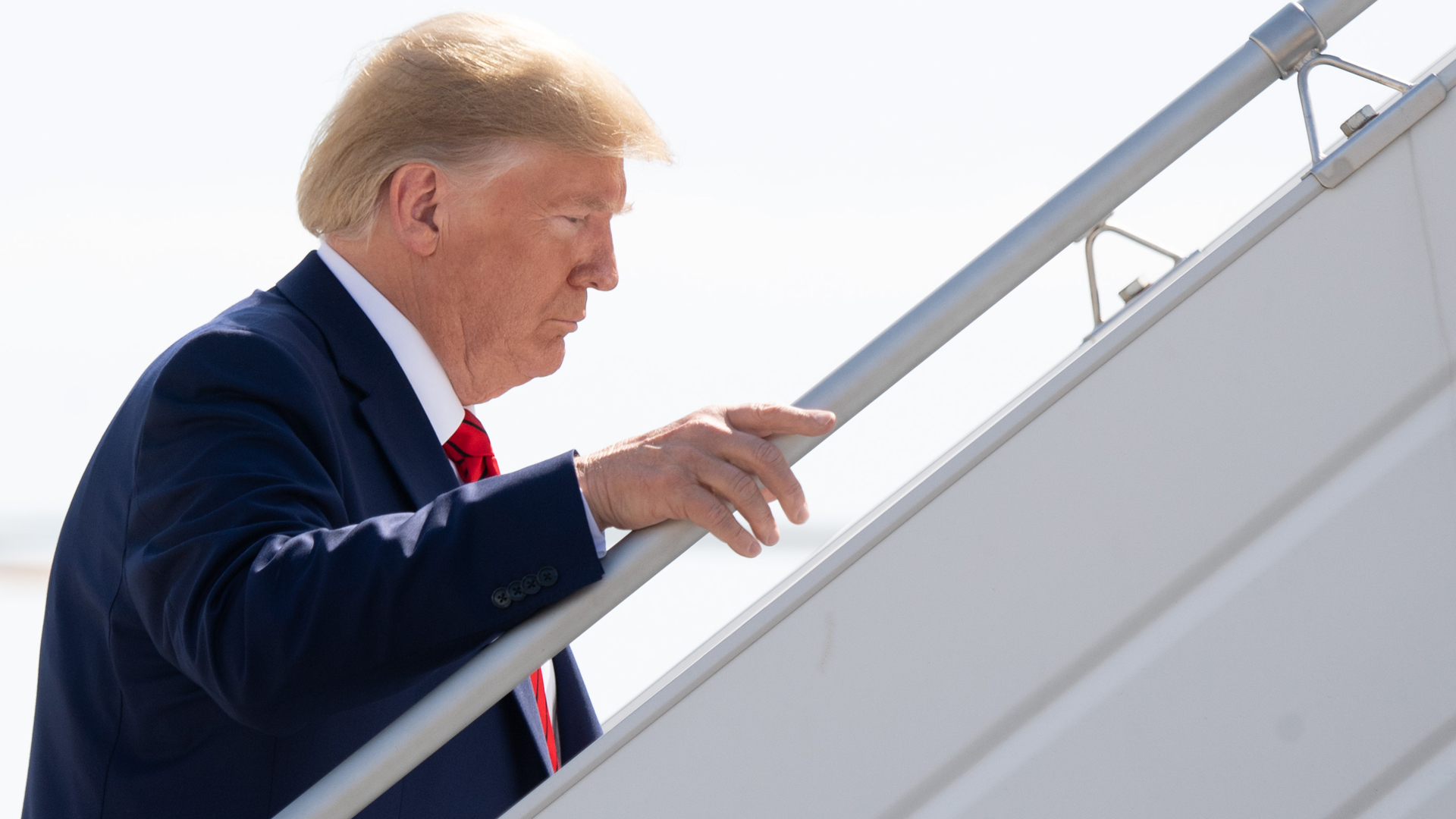 President Donald Trump boards Air Force One prior to departure from John F. Kennedy International Airport in New York on Sep. 26, 2019. (Credit: Saul Loeb/AFP/Getty Images)