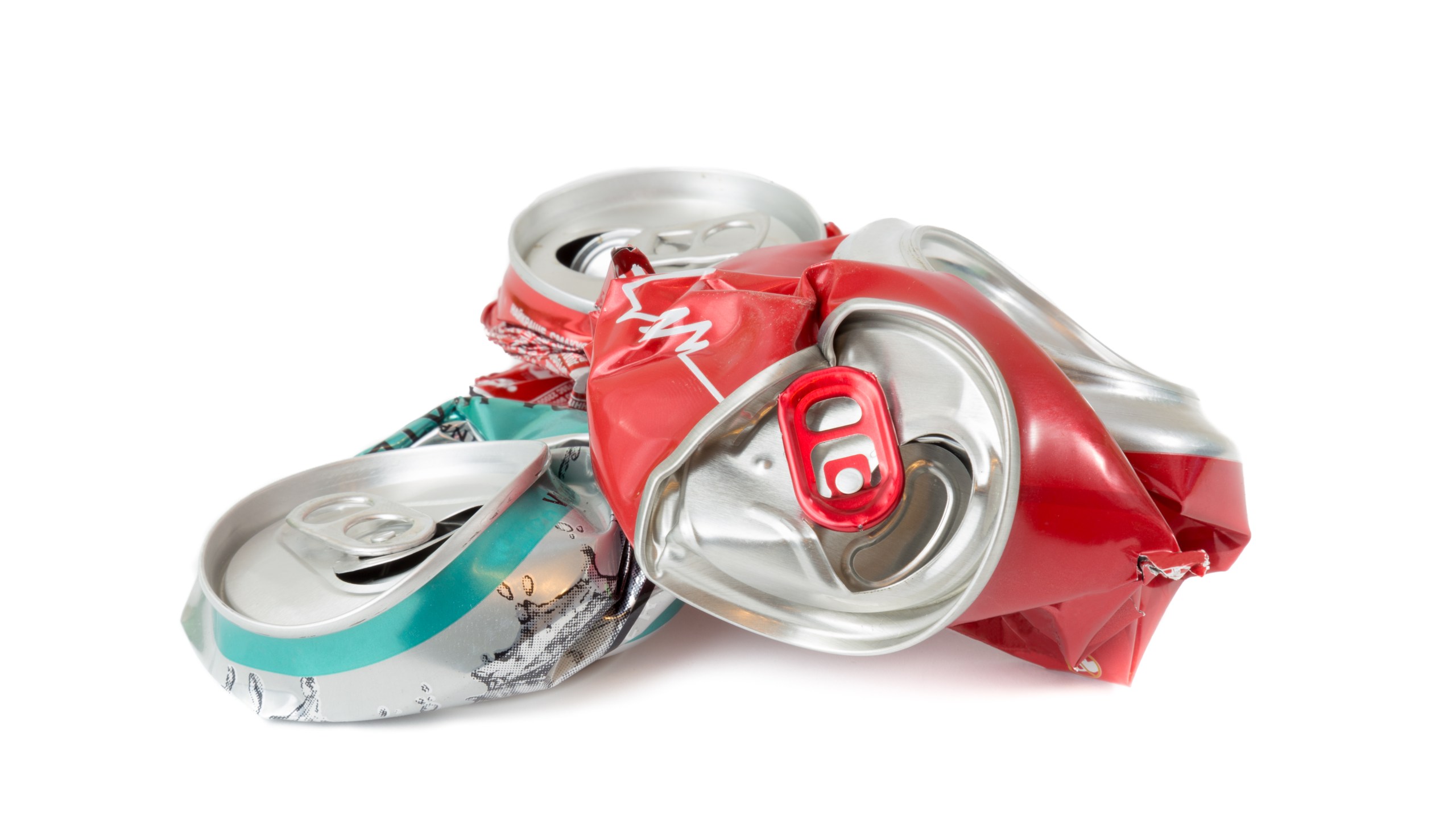 Crushed soda cans are seen in a file photo. (Credit: Getty Images)