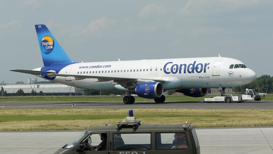 A passenger airplane of German airline Condor, owned by travel agency Thomas Cook, taxis at Schoenefeld Airport during the ILA Berlin Air Show on June 9, 2010 in Berlin, Germany. (Credit: Sean Gallup/Getty Images)