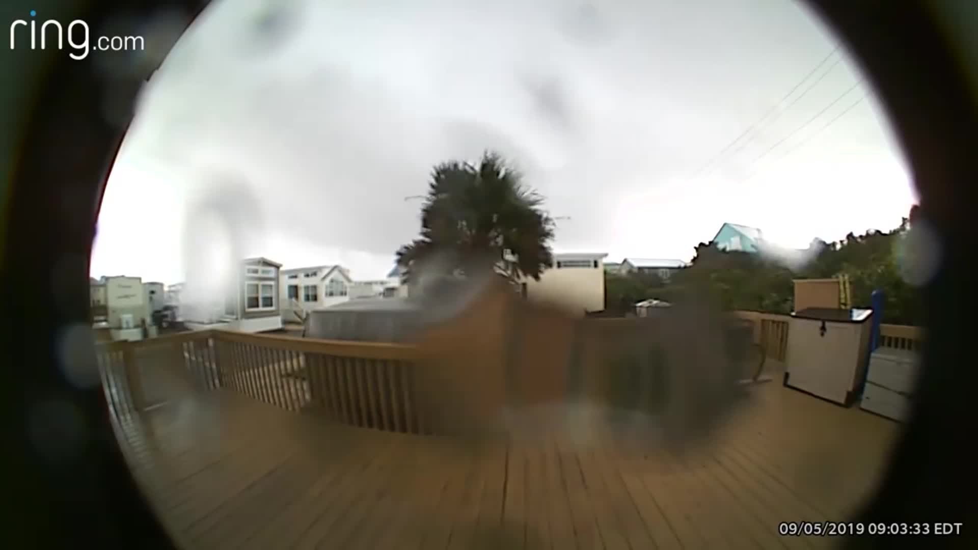 A man watched on doorbell camera as a tornado from Hurricane Dorian destroyed his home (Credit: Jason Sawyer via CNN Wire)