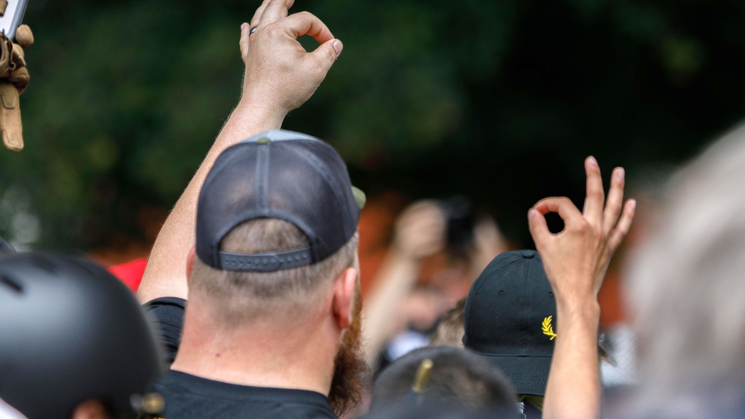 A man makes the "OK" sign in this undated photo. (Credit: John Rudoff/AFP/Getty Images via CNN)