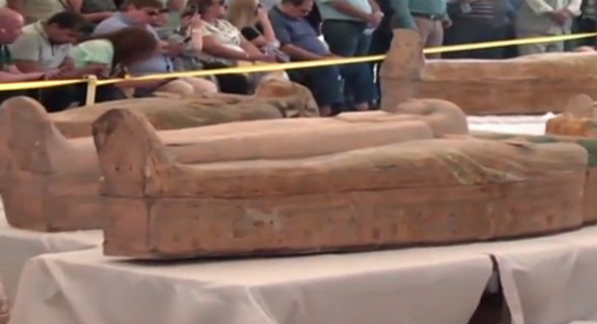 Some of 30 ancient coffins with mummies inside that Egypt unveiled on Oct. 18, 2019, in Luxor, Egypt. (Credit: EGYPTIAN TV via CNN)