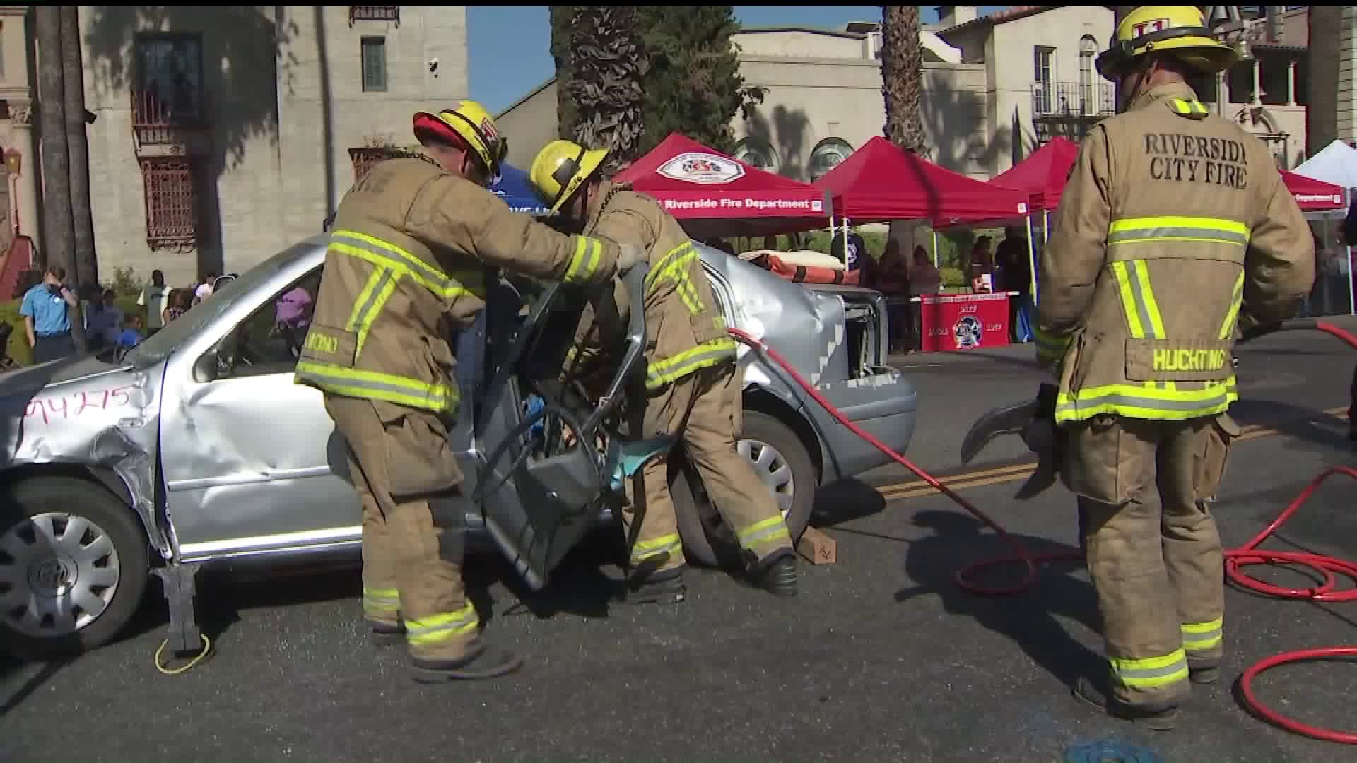 Riverside Fire Department firefighters take part in a demonstration at the Public Safety Expo on Oct. 6, 2019. (Credit: KTLA)