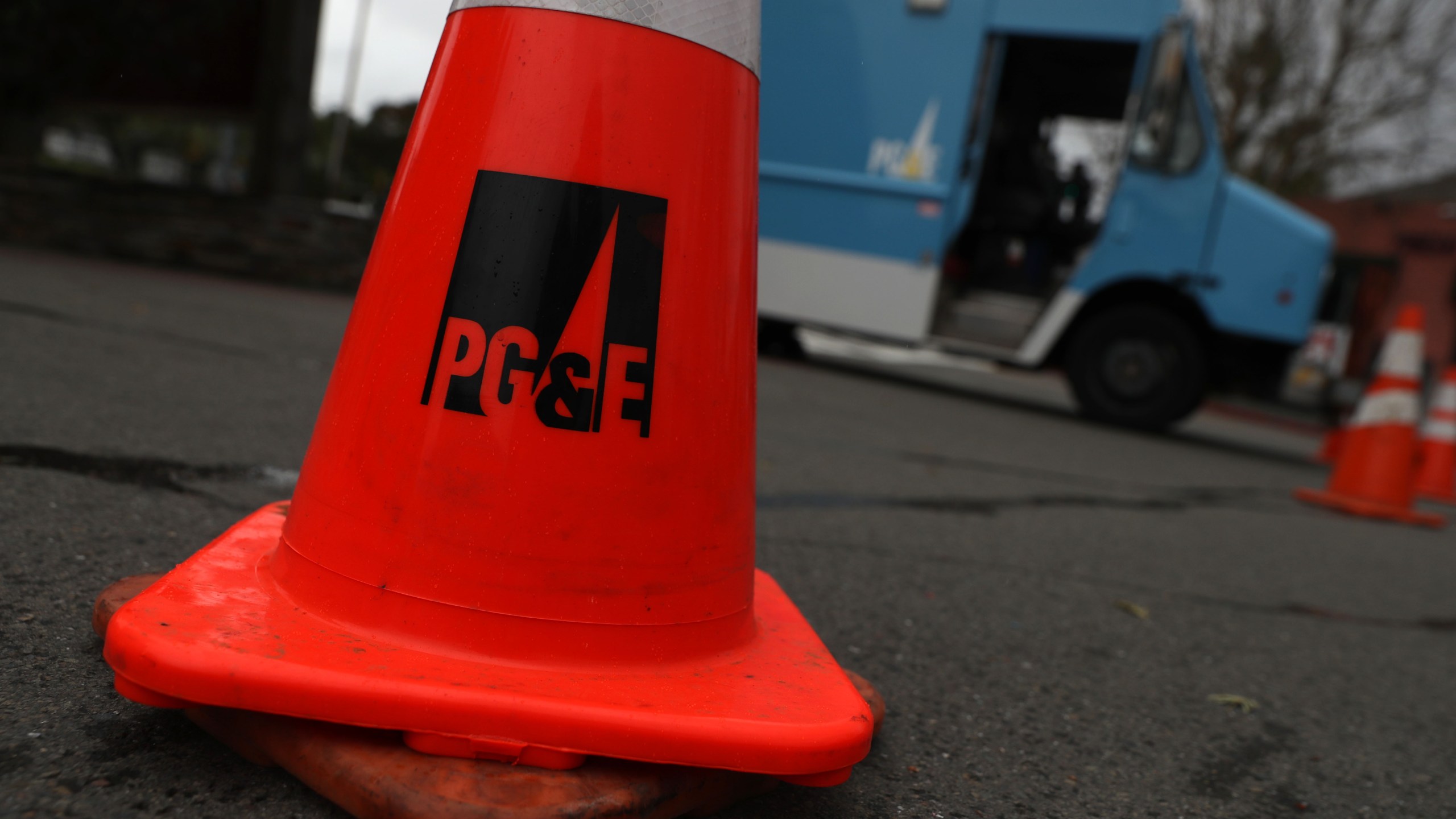 A traffic cone sits next to a Pacific Gas & Electric truck on Jan. 17, 2019 in Fairfax, California. (Credit: Justin Sullivan/Getty Images)