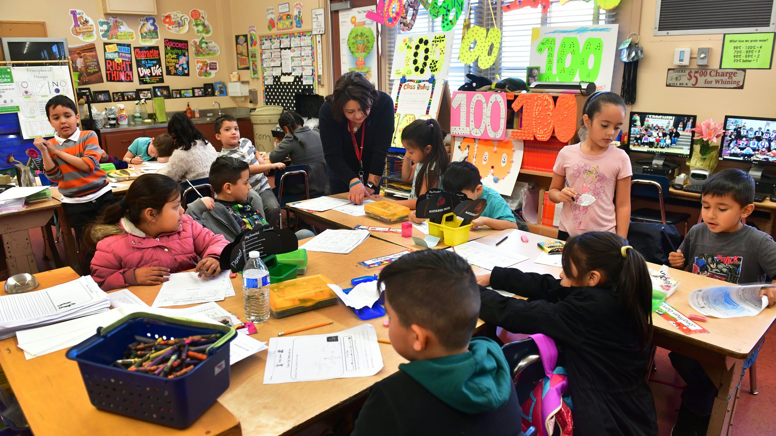 Telfair Elementary School first grade teacher Ms. Gutierrez works with her students on Feb. 8, 2019, in Pacoima. (Credit: FREDERIC J. BROWN/AFP/Getty Images)