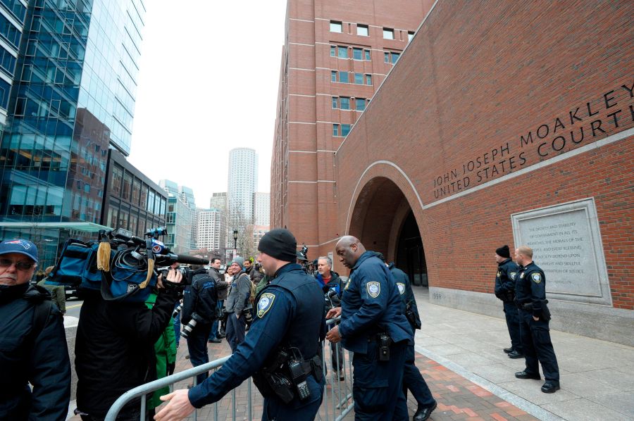 Police set up barricades at the John Joseph Moakley U.S. Courthouse during a hearing on the college admissions scandal on March 29, 2019, in Boston. (Credit: JOSEPH PREZIOSO/AFP/Getty Images)