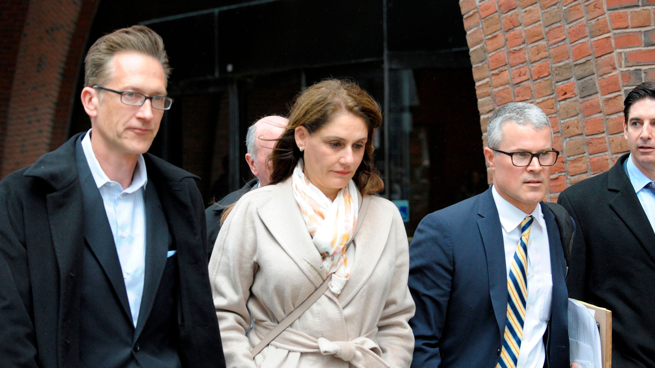 Michelle Janavs makes her way out of the courthouse after giving her plea in front of a judge for charges in the college admissions scandal at the John Joseph Moakley U.S. Courthouse on March 29, 2019. (Credit: JOSEPH PREZIOSO/AFP/Getty Images)