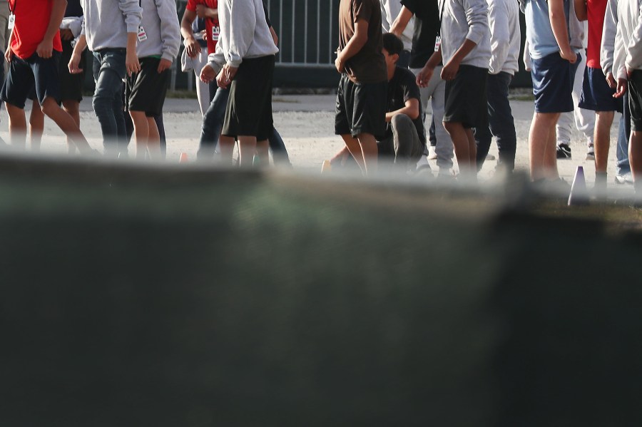 Minors exercise in a common area at the Homestead shelter for unaccompanied migrant children on April 8, 2019, in Homestead, Florida. (Joe Raedle/Getty Images)