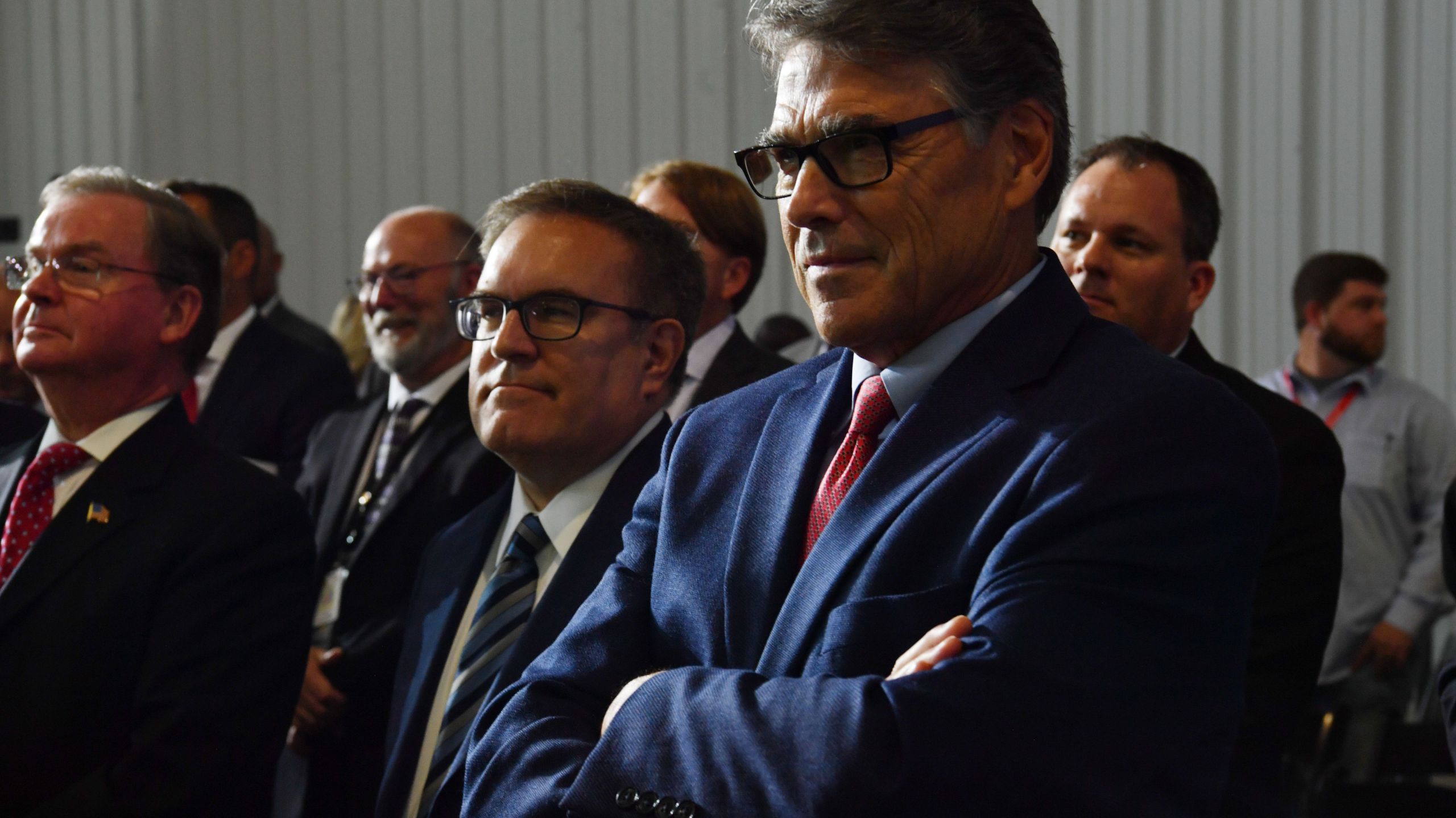 US Energy Secretary Rick Perry listens as US President Donald Trump speaks at the Shell Pennsylvania Petrochemicals Complex in Monaca, Pennsylvania, on August 13, 2019. (Credit: NICHOLAS KAMM/AFP/Getty Images)