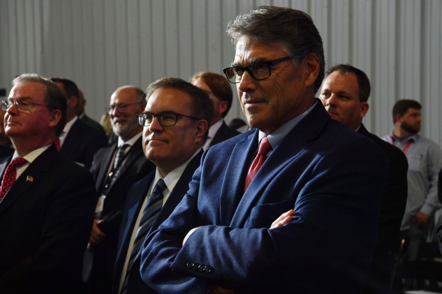 US Energy Secretary Rick Perry listens as US President Donald Trump speaks at the Shell Pennsylvania Petrochemicals Complex in Monaca, Pennsylvania, on August 13, 2019. (Credit: NICHOLAS KAMM/AFP/Getty Images)