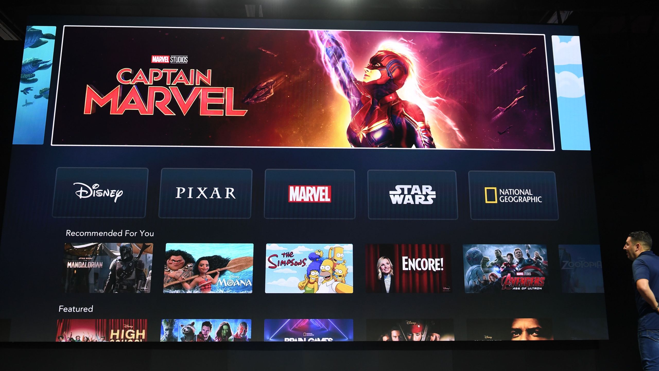 The interface of the Disney+ streaming service is displayed on Apple Inc.'s AppleTV at the D23 Expo on Aug. 23, 2019 at the Anaheim Convention Center. (Credit: ROBYN BECK/AFP/Getty Images)