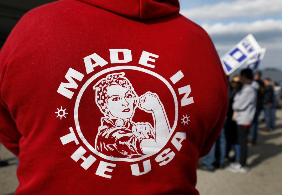 United Auto Workers union members and their families rally near the General Motors Flint Assembly plant on Solidarity Sunday on Oct. 13, 2019 in Flint, Michigan. (Credit: Bill Pugliano/Getty Images)