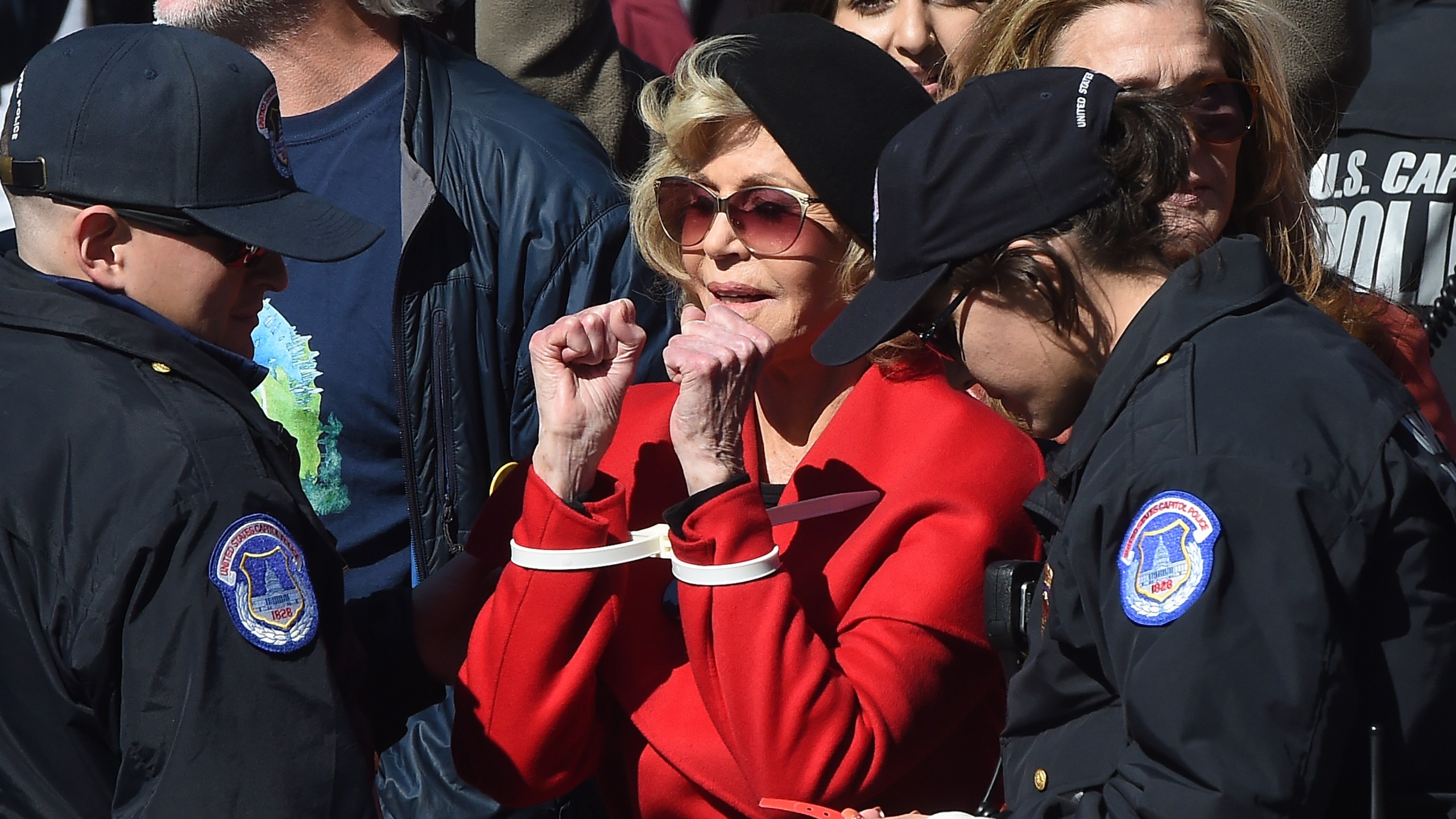 Actress Jane Fonda is arrested for blocking a street in front of the U.S. Capitol during a “Fire Drill Fridays” climate change rally on Oct. 18, 2019. (Credit: Mark Wilson / Getty Images)