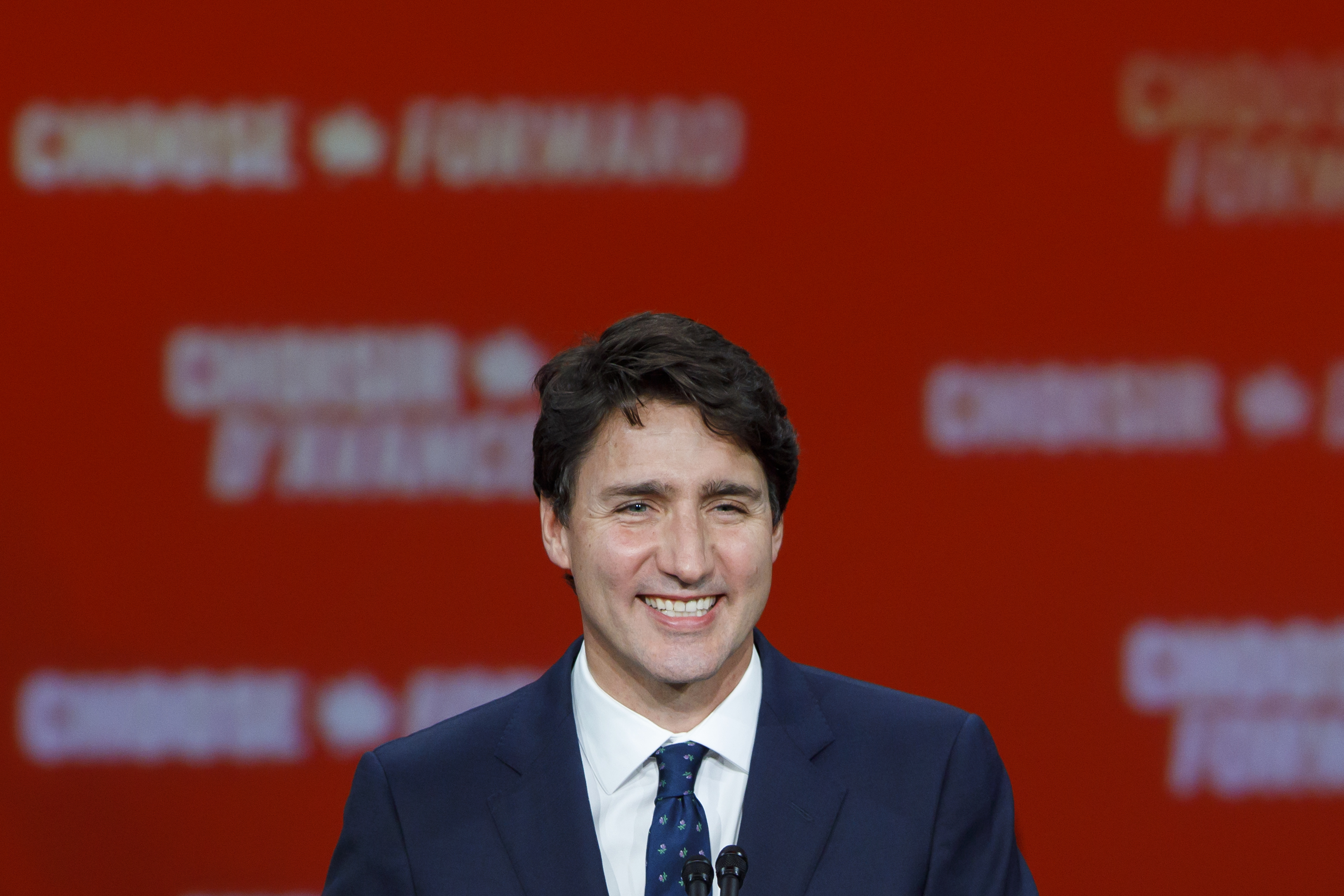 Prime Minister Justin Trudeau smiles as he delivers his victory speech at his election night headquarters on Oct. 21, 2019 in Montreal, Canada. (Credit: Cole Burston/Getty Images)