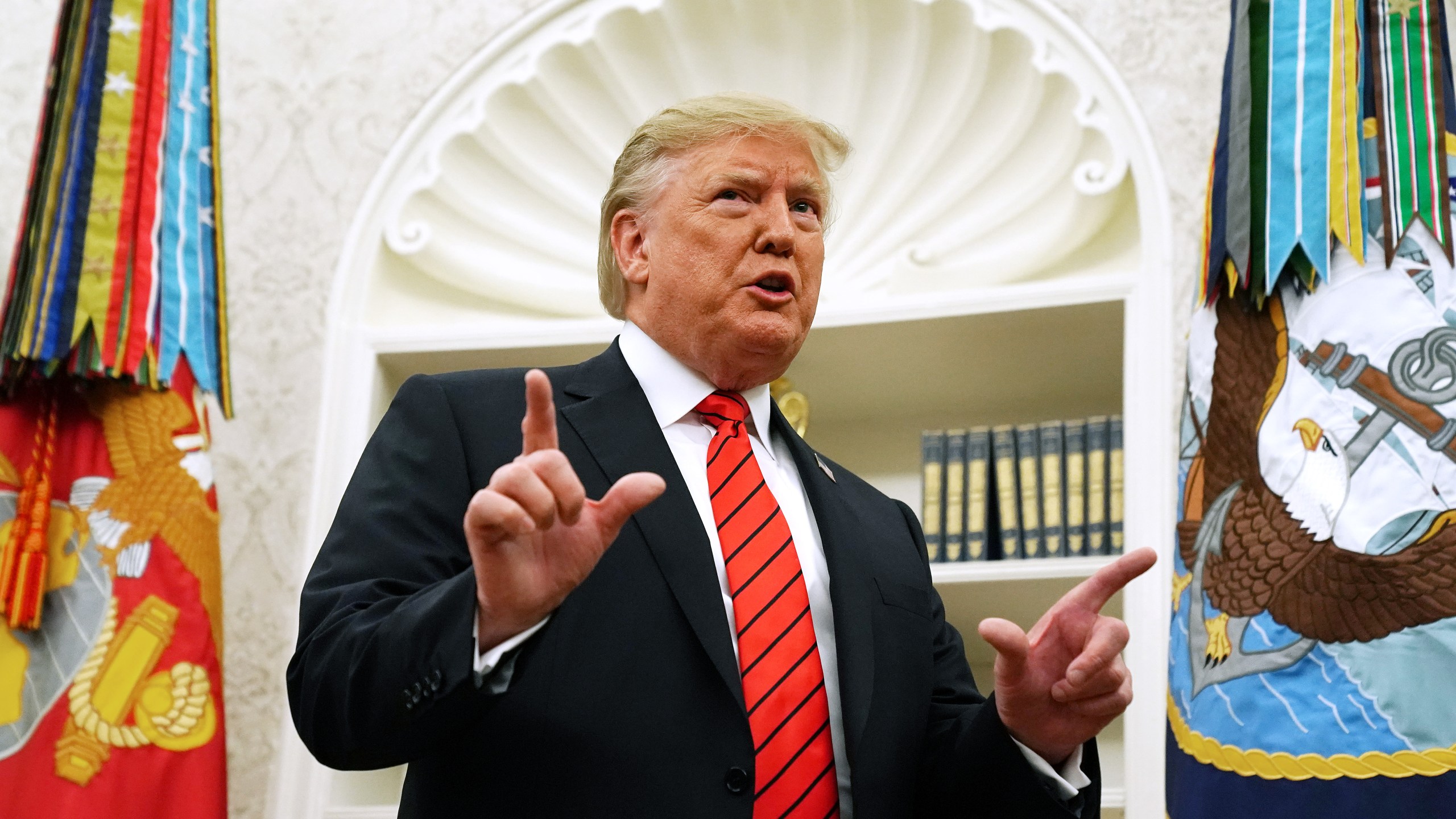 President Donald Trump pauses to answer a reporter's question about a whistleblower as he leaves the Oval Office at the White House on Sept. 30, 2019. (Credit: Chip Somodevilla / Getty Images)