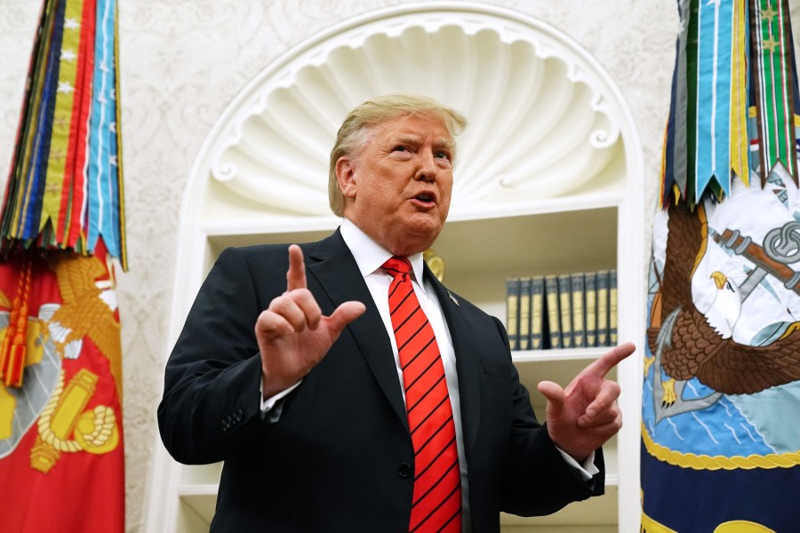 President Donald Trump pauses to answer a reporter's question about a whistleblower as he leaves the Oval Office at the White House on Sept. 30, 2019. (Credit: Chip Somodevilla / Getty Images)