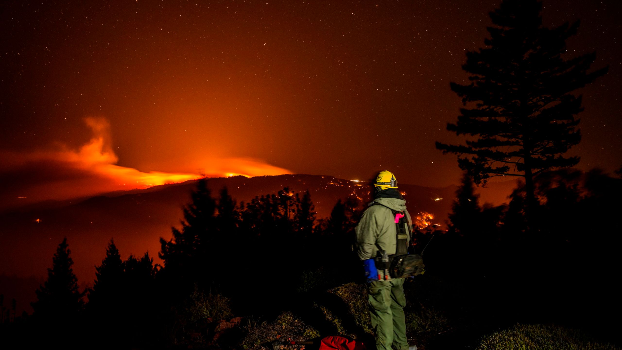 The Kincade fire burns on a ridge between Lake and Sonoma Counties on October 29, 2019. (Credit: PHILIP PACHECO/AFP via Getty Images)