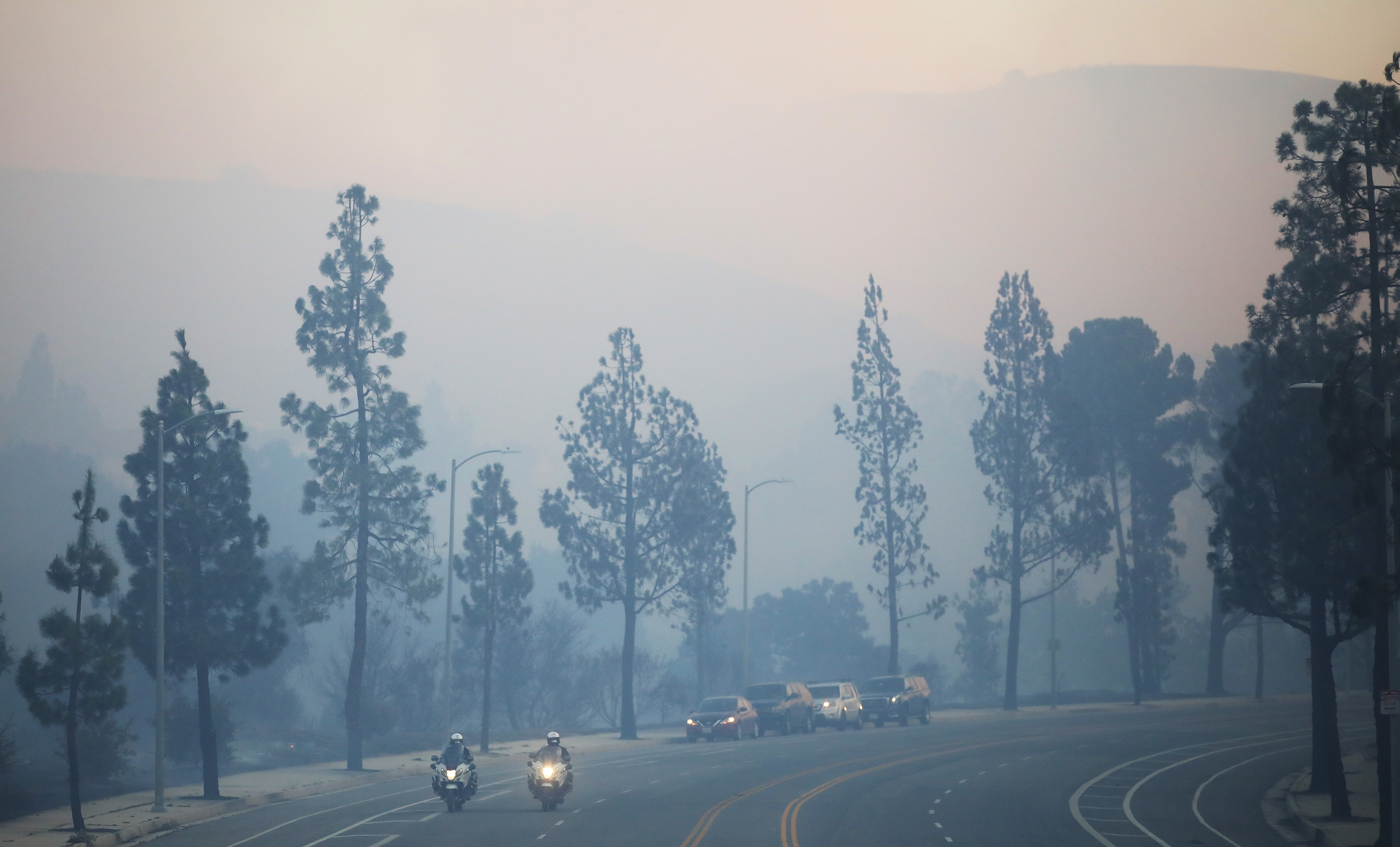 Smoke from the Saddleridge Fire rises on Oct. 11, 2019 near Porter Ranch. (Credit: Mario Tama/Getty Images)