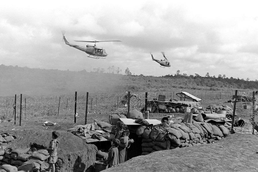 Watch helicopters arriving at an American camp in Plei Me, south Vietnam in Nov. 1, 1965. (Credit: AFP via Getty Images)