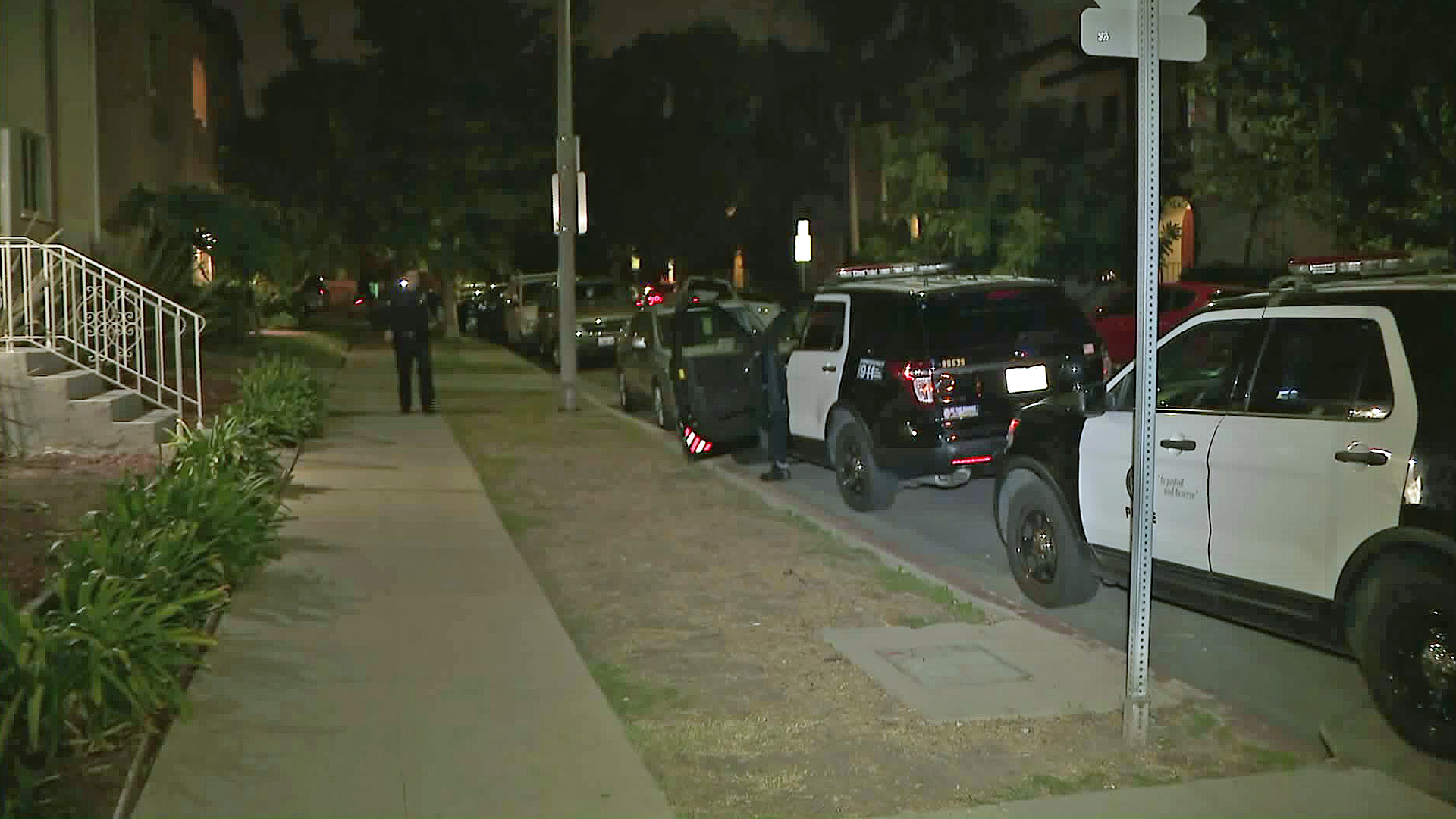 Police investigate a home invasion in the Fairfax neighborhood on Oct. 10, 2019.