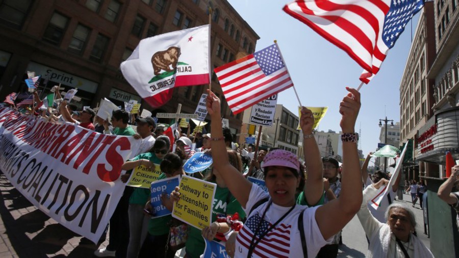 In this undated photo, demonstrators march in downtown Los Angeles in support of comprehensive immigration reform.(Credit: Irfan Khan / Los Angeles Times)