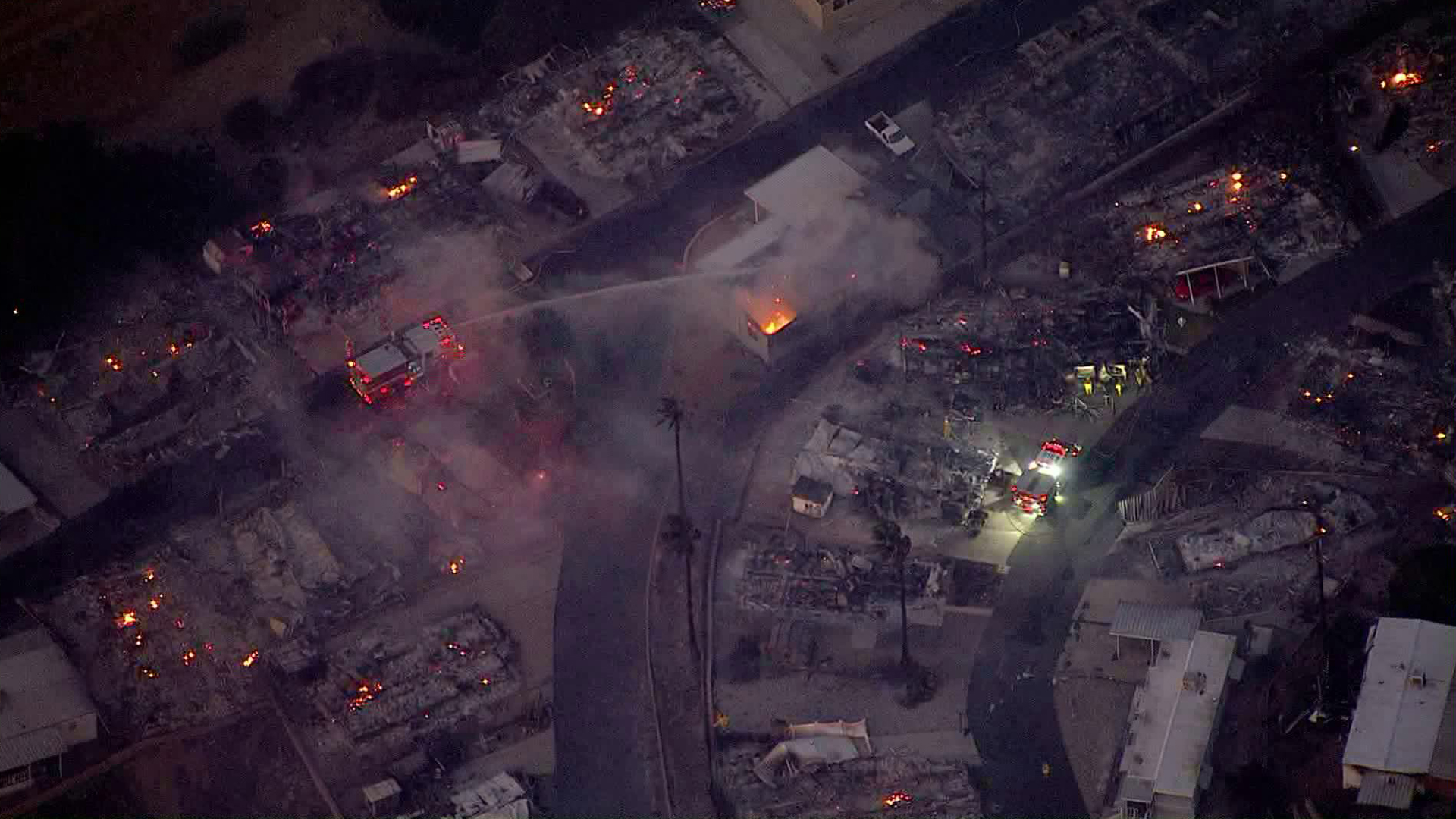 Devastation surrounds a smoldering residence after a fire destroyed much of a Calimesa mobile home park on Oct. 10, 2019. (Credit: KTLA)