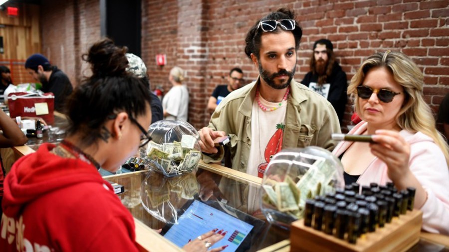 Customers peruse cannabis products at a dispensary in Los Angeles in 2018. (Gary Coronado / Los Angeles Times)