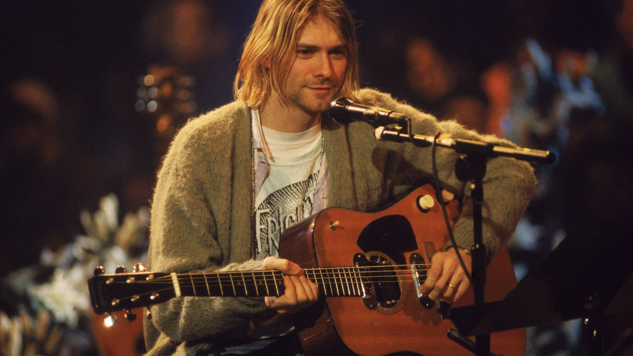 Kurt Cobain wears his green cardigan during the taping of Nirvana's performance on "MTV Unplugged" in November 1993. (Credit: CNN)