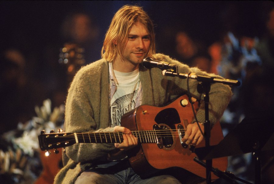 Kurt Cobain wears his green cardigan during the taping of Nirvana's performance on "MTV Unplugged" in November 1993. (Credit: CNN)