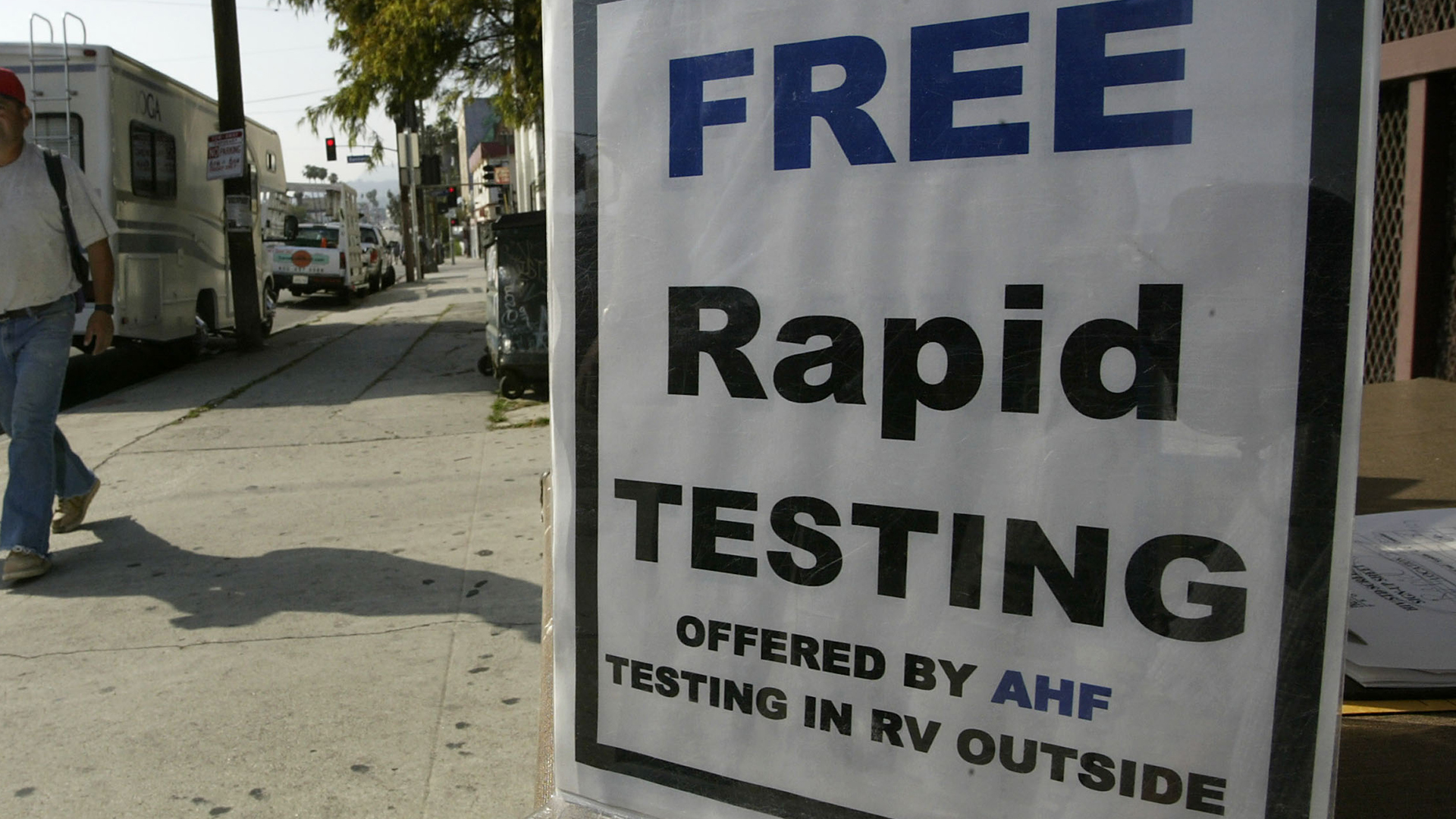 A motorhome converted into a mobile HIV screening lab by the AIDS Healthcare Foundation (AHF) is parked on a busy street on its first day of operations on April 28, 2004 in Los Angeles. (Credit: David McNew/Getty Images)