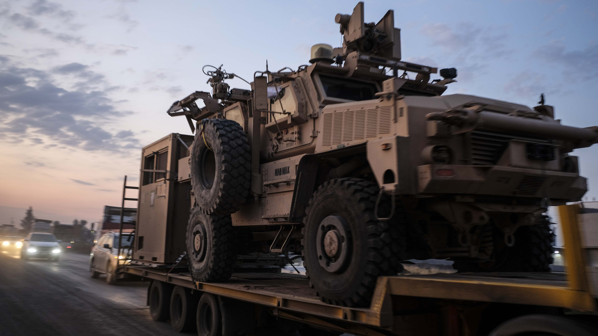 A convoy of U.S. armored military vehicles leave Syria on a road to Iraq on October 19, 2019 in Sheikhan, Iraq. (Credit: Byron Smith/Getty Images)