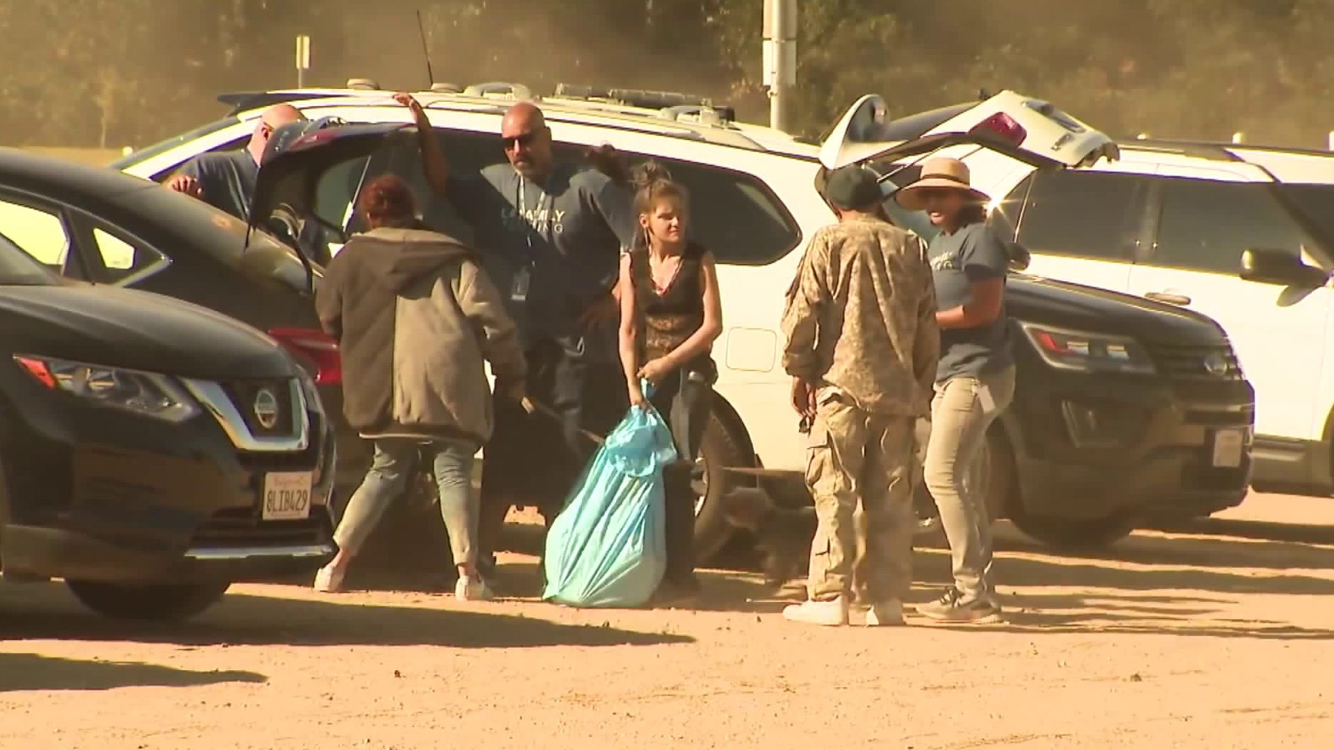 Crews clean up at a homeless encampment at the Sepulveda Basin on Nov. 4, 2019. (Credit: KTLA)