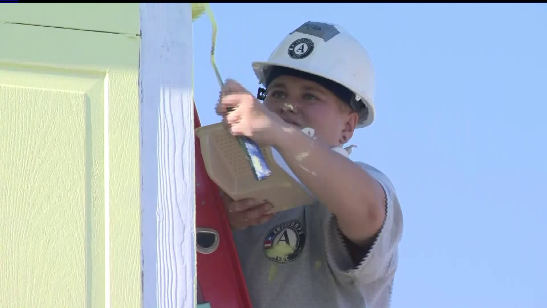 Volunteers with Habitat for Humanity gathered on Nov. 23, 2019, to help rebuild and paint homes destroyed in the Woolsey Fire.