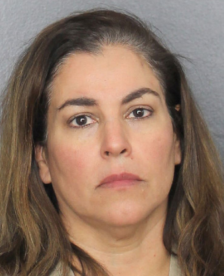 Yvonne Serrano, 51, has been charged with killing a 21-year-old woman found in her driveway, police said. (Credit: Coral Springs Police)