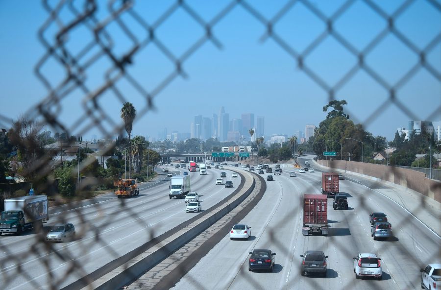 High-rise buildings in downtown Los Angeles are seen on on a hazy morning on Sept. 21, 2018. Eighty-seven days of smog made it the longest stretch of bad air in at least 20 years. (Credit: FREDERIC J. BROWN/AFP via Getty Images)